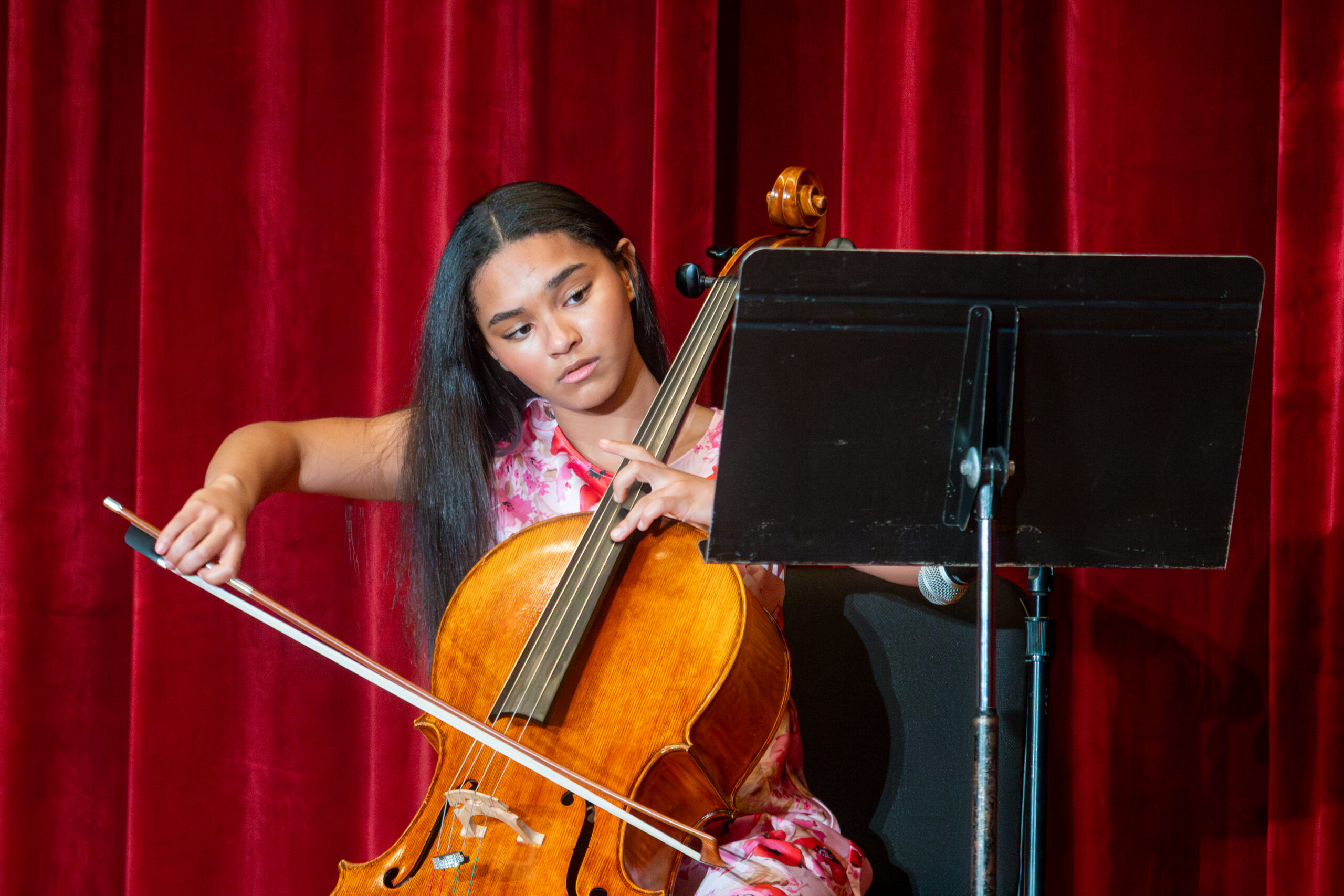 Student performing cello solo